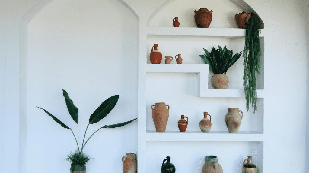 Display a collection of handmade terracotta pots. Source: Canva