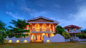 There used to be a time when the "Goan Dream" was strictly defined by a Portuguese-style villa with a large balcão. Source: Canva