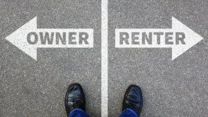 a road with two arrow signs - owner and renter